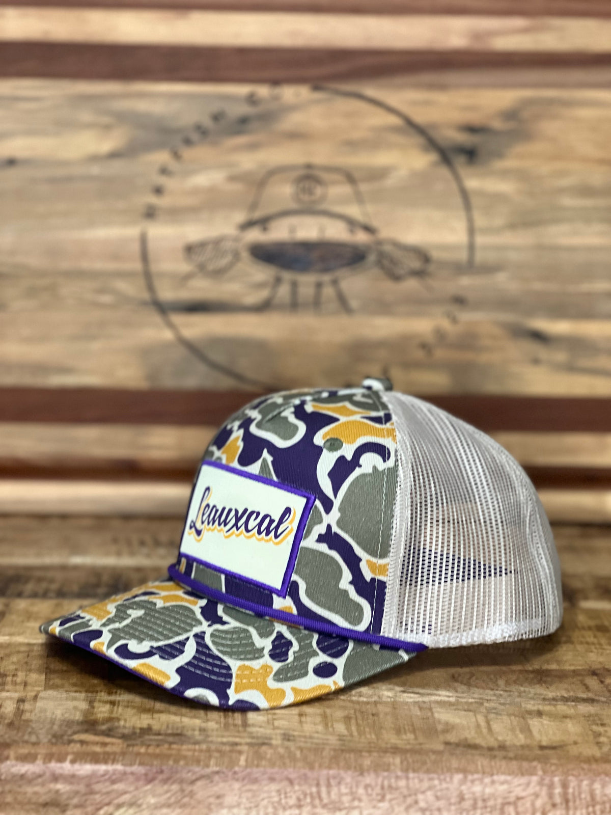 The Leauxcal Camo Trucker Hat