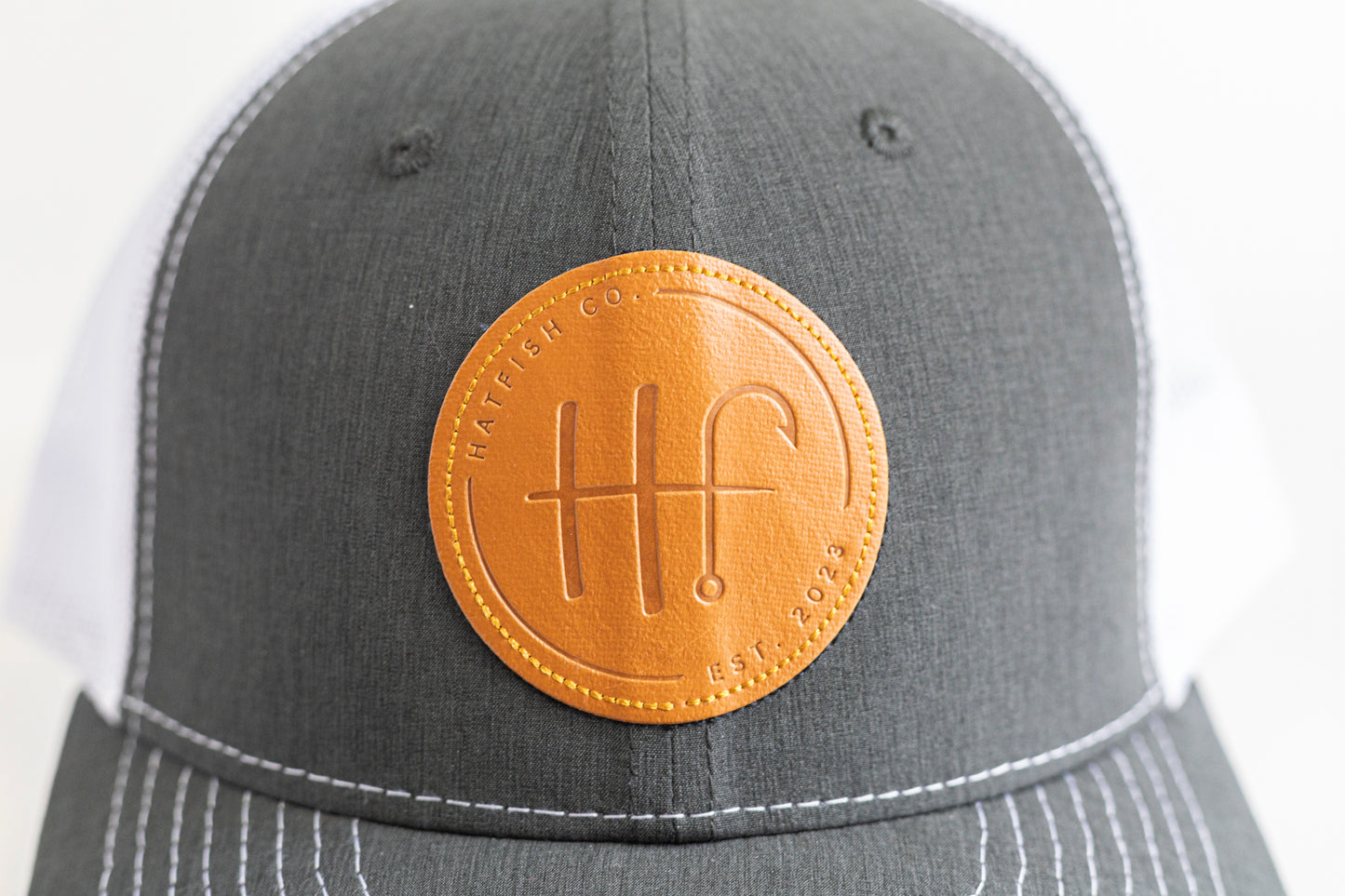 HATFISH CO Leather Logo Trucker Cap